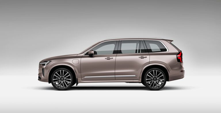 Copper Volvo CX90 car left facing with grey shadow background