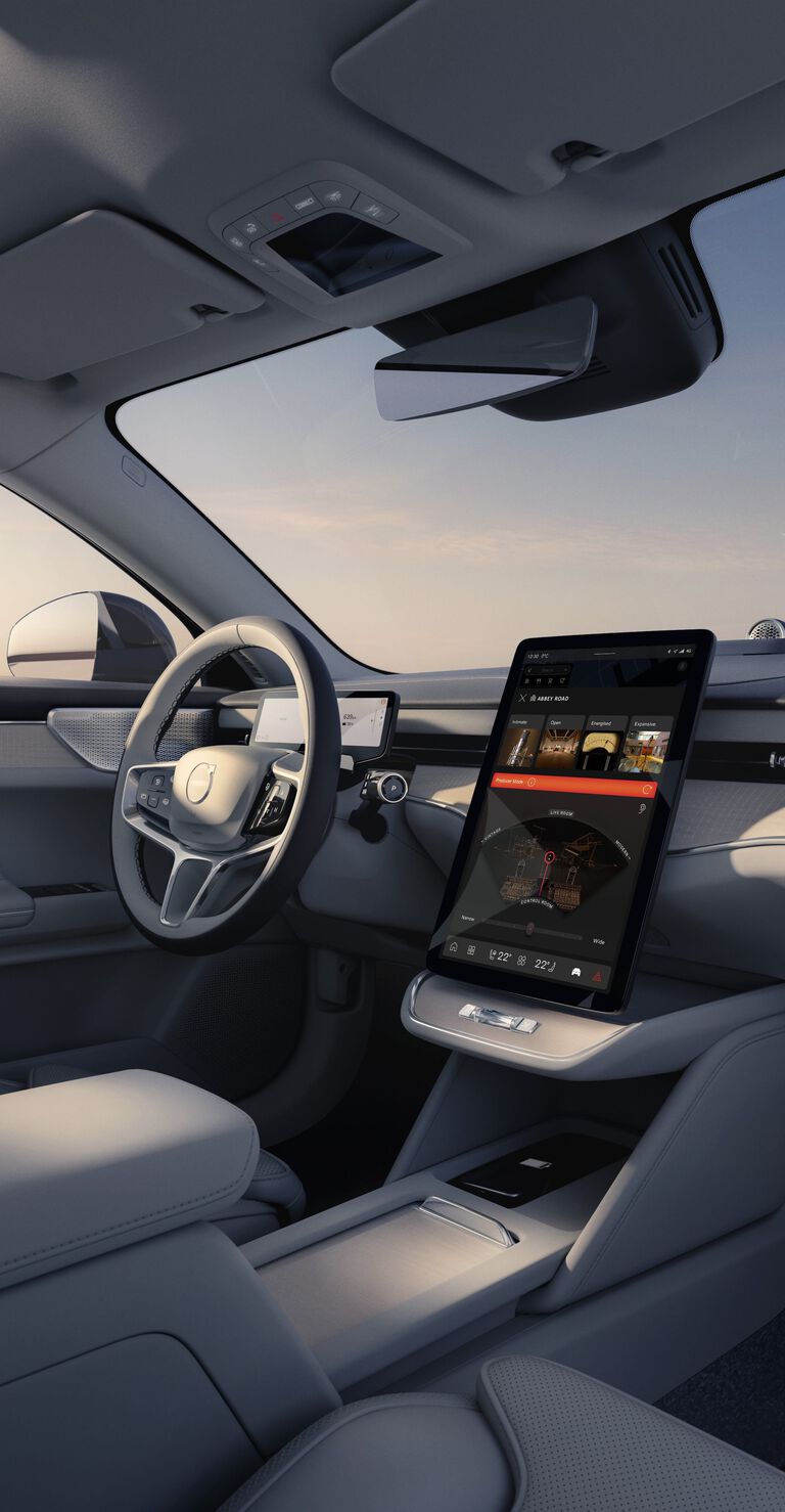 Driver side of Volvo car with gray leather interior